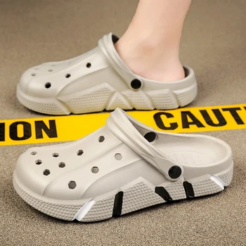 Мужская обувь с дырками, Новинка 2023 года, летняя модная обувь на плоской подошве для отдыха на открытом воздухе, нескользящие, удобные, на мягкой подошве, однотонные Базовые мужские тапочки